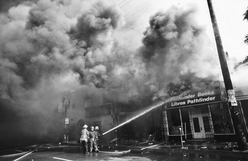 The Pathfinder bookstore on Pico Blvd. burns in the Pico-Union area of Los Angeles during the riots in 1992.