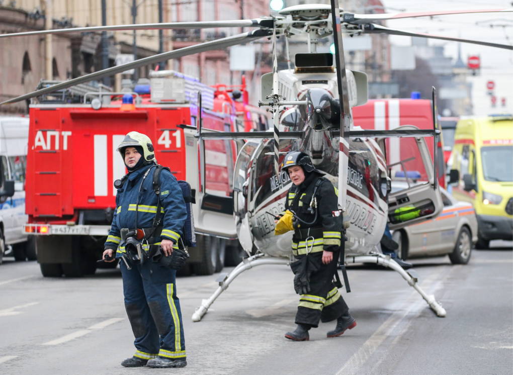 Rescue workers near the scene of the explosion on Monday in St. Petersburg, Russia.
