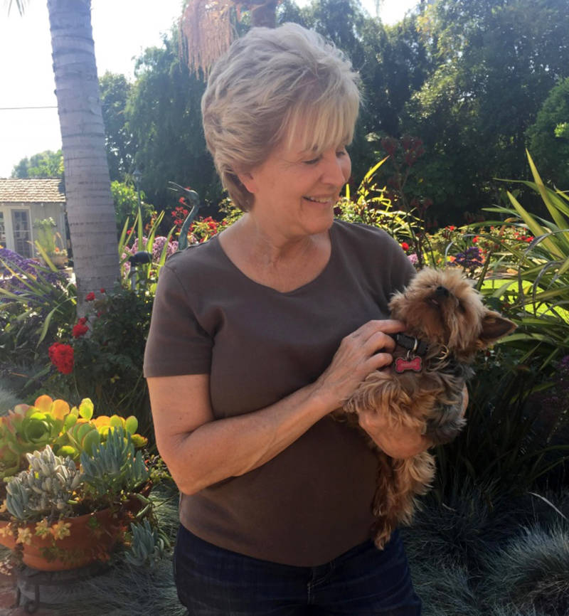 Donna Perez with her pet Yorkie, Cody. Her other dog was killed by a coyote in her backyard last fall.