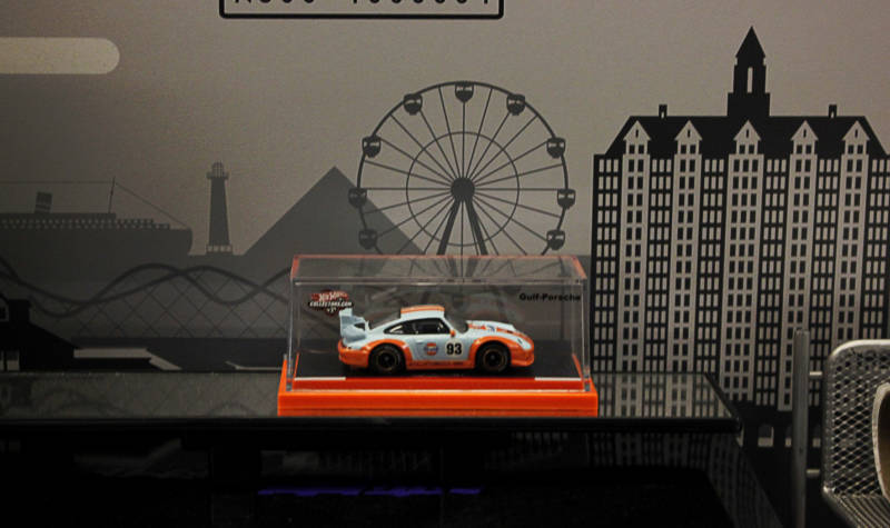 One of many Hot Wheels toy cars from Alvin’s collection sits on his desk at work.