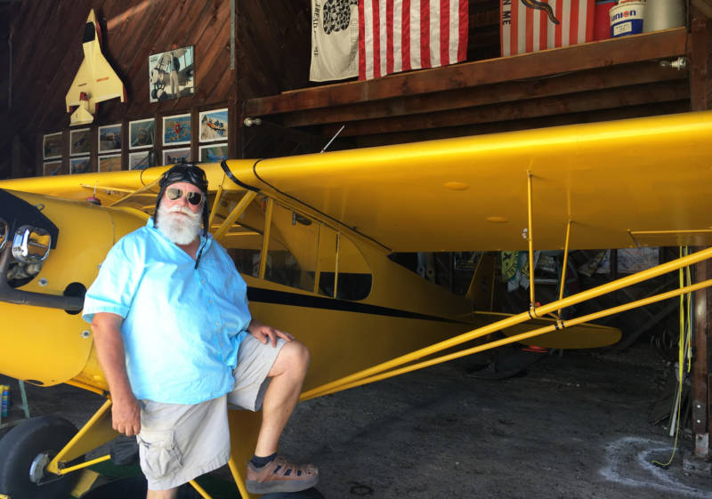 Willows resident Greg Michael at the hangar where he stores his 1946 J-3 Cub.