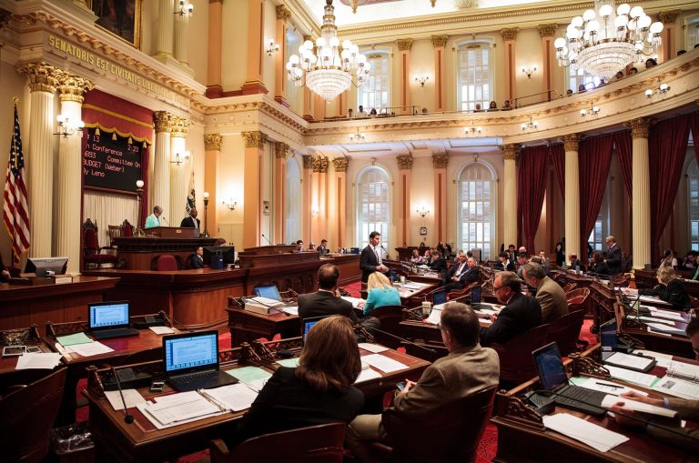 Senators meet in the California Senate chambers in Sacramento.