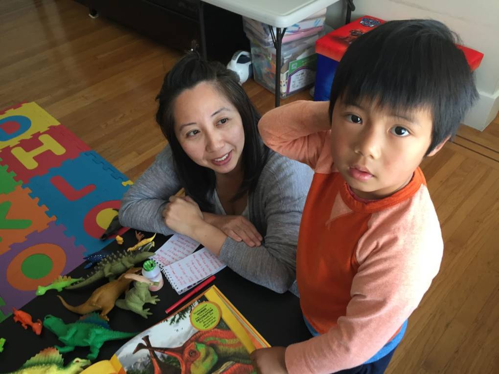 Kolten Wong, a five-year-old dinosaur aficionado seen here at home in Daly City with his mom, Annie, wanted to know what dinosaurs used to roam the Bay Area.