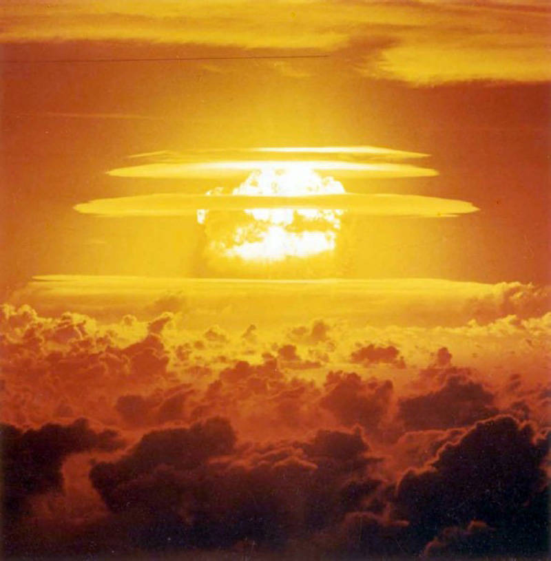 This is an archival photo of Castle Bravo, 3.5 seconds after detonation. at a a distance of 75 nautical miles from ground zero. This bomb was the largest and dirtiest bomb ever detonated by the U.S. It was so large you can still see the crater from space. 