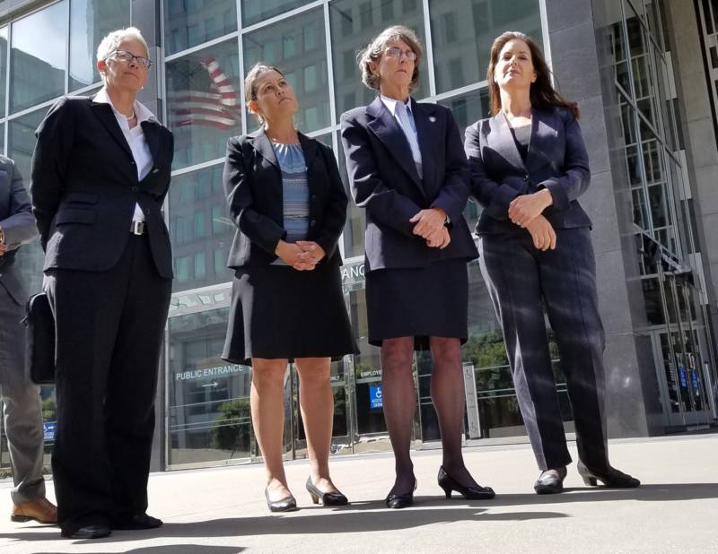 From left, Oakland Police Department spokeswoman Officer Johnna Watson, City Administrator Sabrina Landreth, Police Chief Anne Kirkpatrick and Mayor Libby Schaaf gather outside federal court in San Francisco on July 10, 2017.