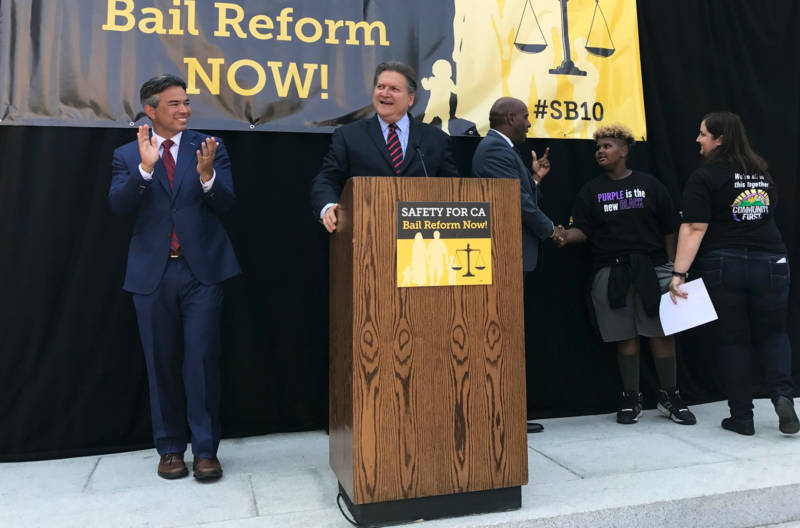Assemblyman Rob Bonta (L) and Sen. Bob Hertzberg addressed supporters of bail reform at an Aug. 23, 2017, Capitol rally.
