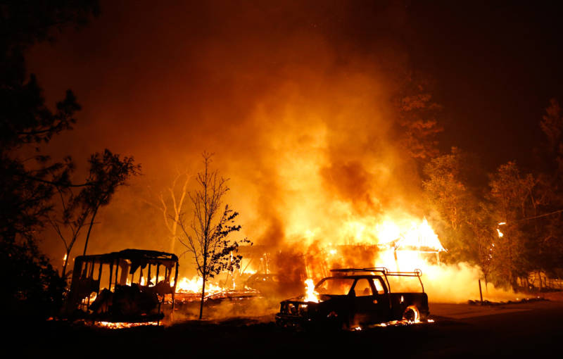 A car and home burn during the Valley Fire on September 13, 2015 in Middletown.
