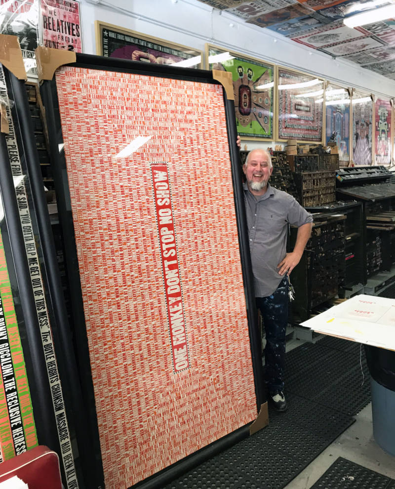Kevin Bradley with one of his larger letterpress works at his Santa Monica-based Church of Type.