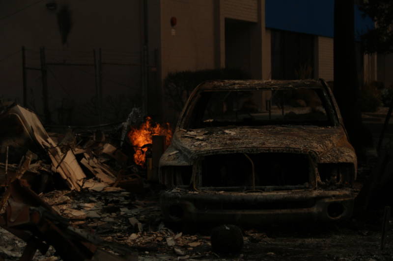 A car sits burnt at Journey's End Mobile Home Park in Santa Rosa.
