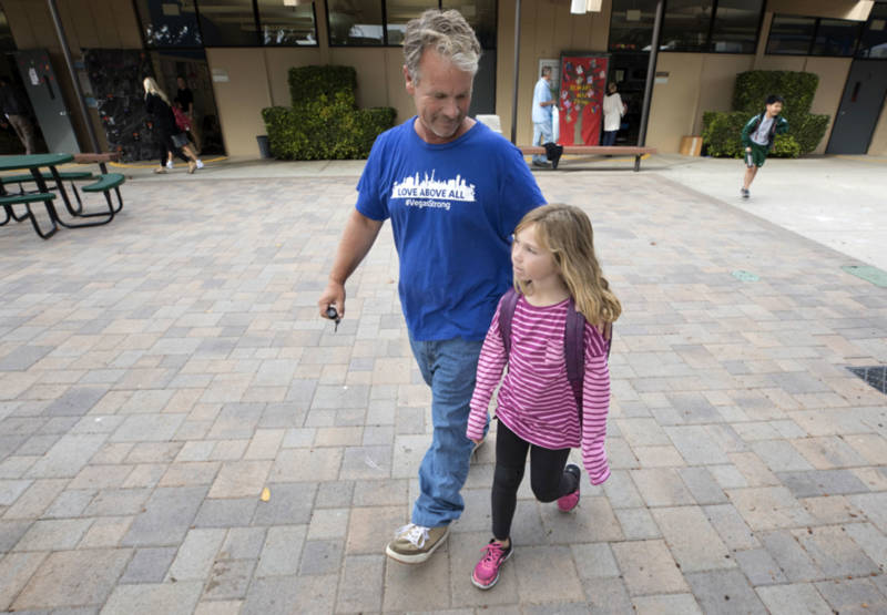 Bob Patterson picks up his daughter from school in Lomita on Oct. 30, 2017.