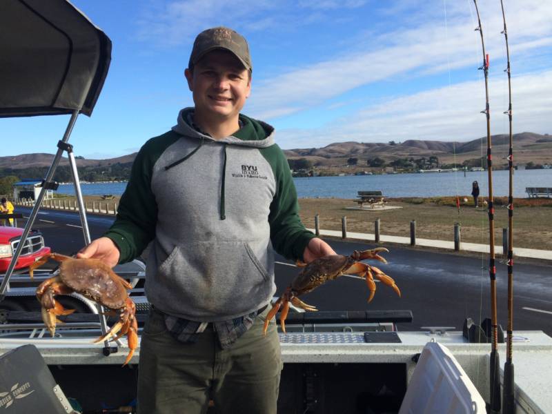 Fairfield resident, Drew Rutherford, shows off freshly caught crab. 