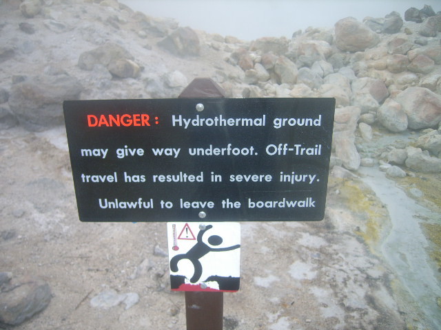 A sign on the boardwalk at Bumpass Hell warns visitors to stay on the path.