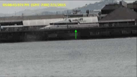 Surveillance footage from another pier a little over a quarter mile southwest of Pier 14. The arrow points to the seat defendant Jose Ines Garcia Zarate occupied later.