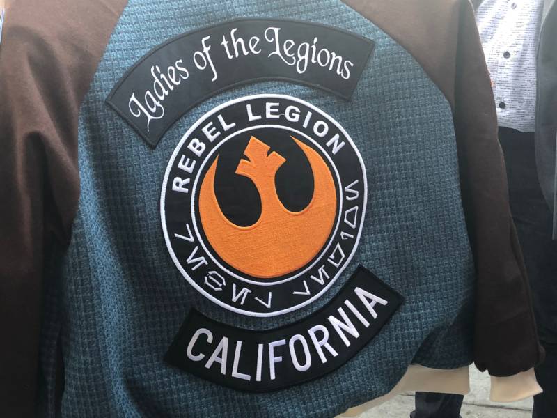 Members of the costume club Rebel Legion adorn their jackets with patches earned through involvement in the Star Wars fan community. Ladies of the Legions is one of many smaller unofficial communities within the larger costume groups.