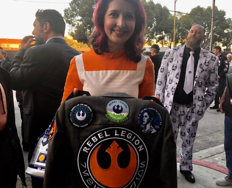 Pat Yulo shows off her patches, earned through participating in the Rebel Legion. She has created numerous screen-accurate costumes for herself, in addition to lending her skills to her fellow group members.