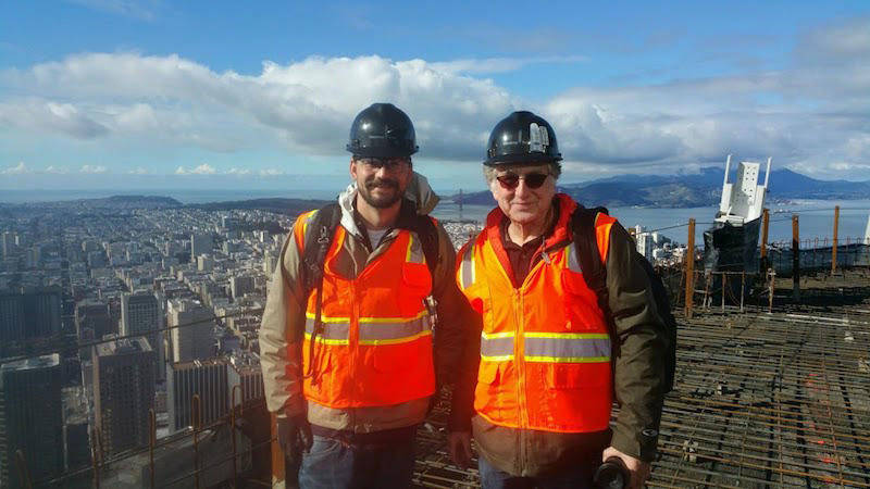 Jim Campbell (R) and Sean McGowen on the roof of Salesforce Tower before the crown was built.