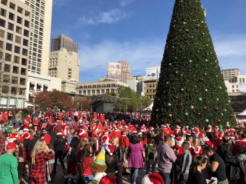 Thousands of people converged on San Francisco's Union Square on Saturday, Dec. 9, 2017 for SantaCon 2017. The daylong event is part-toy drive and part pub crawl.