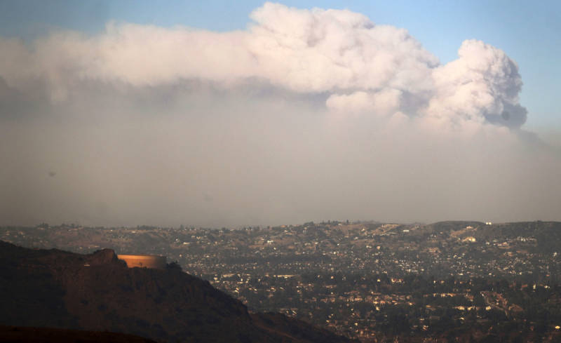 Smoke rises from the Thomas Fire on Dec. 5, 2017 in Ventura