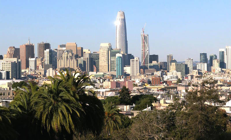 A view from Dolores Park of the San Francisco skyline with the Salesforce Tower in the center.