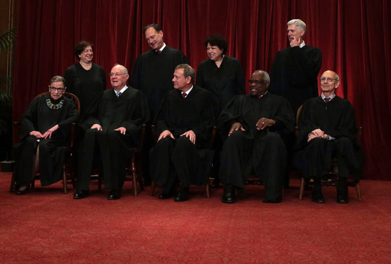 Justice Ruth Bader Ginsburg in the front row of the U.S. Supreme Court group portrait shortly after Justice Gorsuch had joined in 2017.