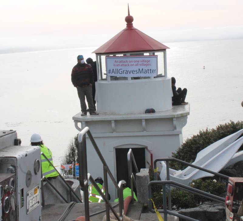 Protesters, including Lucas Garcia, a descendant of the Tsurai Ancestral Village and member of the Yurok Tribe, climbed to the top of the Trinidad Memorial Lighthouse on December 28, 2017 to stop its relocation. They say it puts the village in jeopardy. Meanwhile construction continued to take place at the base of the structure. 