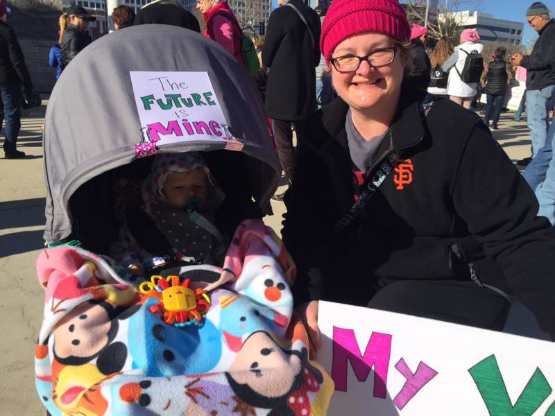 Karen Corpron, from Gilroy, and her baby at the San Jose Women's March. Karen's baby was born this time last year.