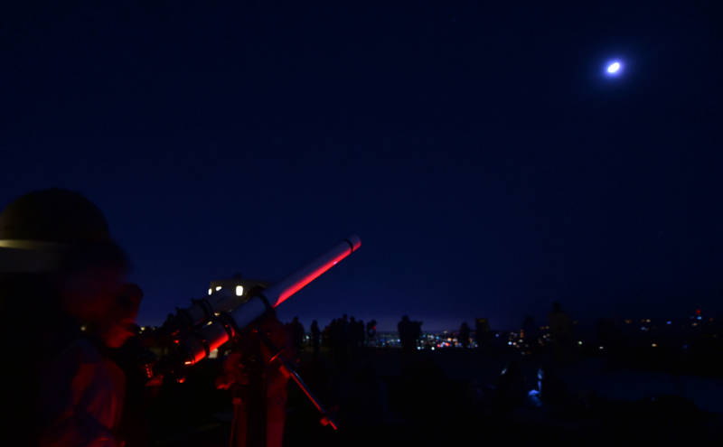 Moongazers attend a lunar eclipse celebration at Griffith Observatory in Los Angeles early on Jan. 31, 2018.
