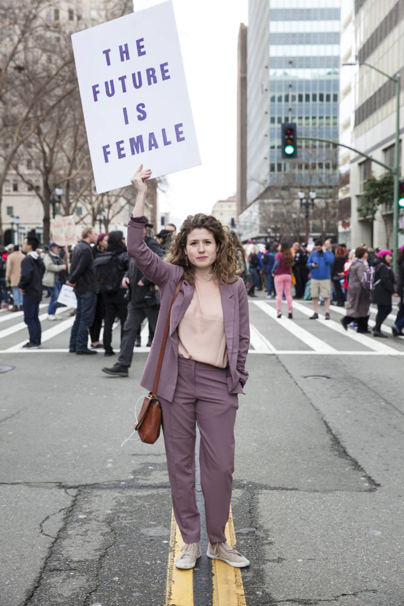Elizabeth Herman, of Oakland, Ca., carried a sign reading The "Future is Female" during the Women’s March in Oakland on Saturday, Jan. 21, 2017. 