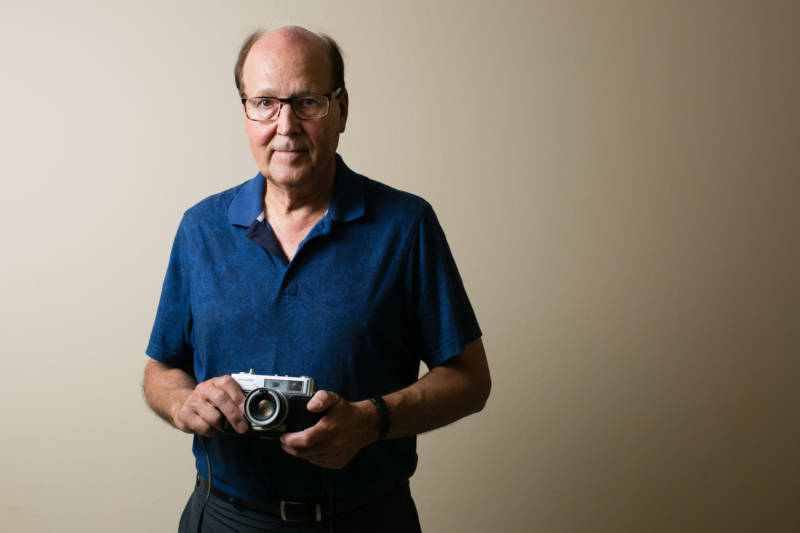 Steven Burchik served in the U.S. Army during the Vietnam War. While he was deployed, he bought a camera and took photos of his fellow soldiers, Vietnamese villagers and the countryside – photos he didn't show anyone for 40 years after he got home. He was photographed in his home on Sept. 13, 2017.