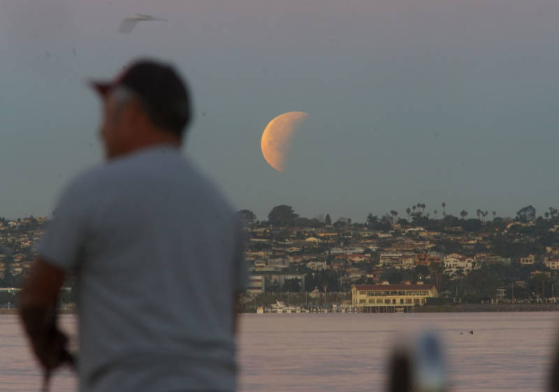 The super blue blood moon sets in San Diego on January 31, 2018.