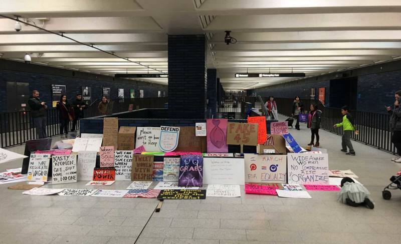 Protest signs left behind at 19th Street BART station following the Oakland Women's March on Jan. 21, 2017.