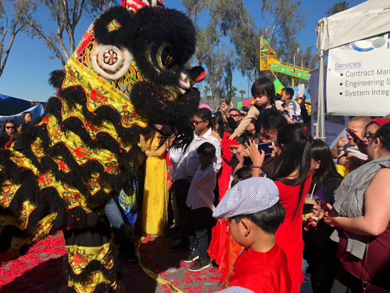 The lion dance and dragon dances was one of the highlights of the event, with multiple performers in each costume coordinating to move around the crowd. 