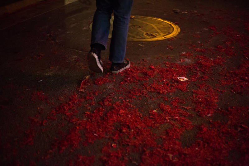 Firecracker debris litters the ground of Chinatown after a successful Lunar New Year celebration in San Francisco.