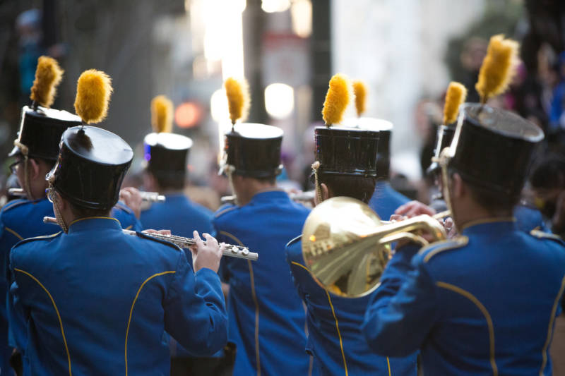 The bass drums of marching bands boomed down Market at the height of the Lunar New Year Parade in San Francisco, revving up the the crowd despite cold temperatures.