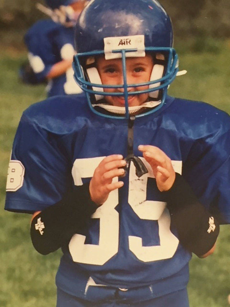 A young Tyler Cornell in his Pop Warner uniform.
