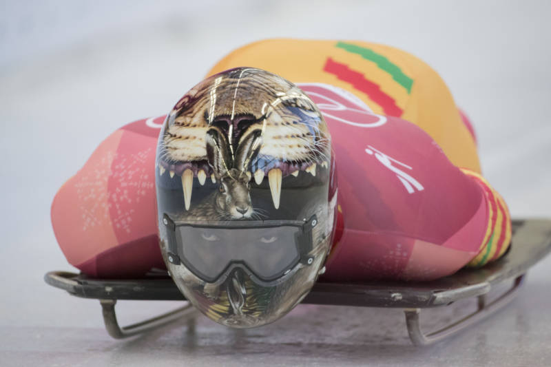 Akwasi Frimpong, Ghana's first skeleton athlete, prepares for the start of his run in the men's event.