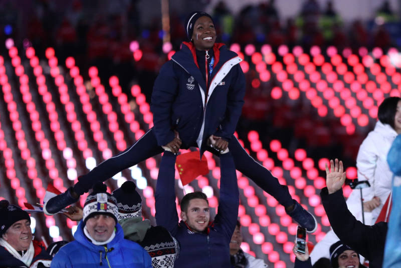Figure skaters Vanessa James and Morgan Cipres of France march in the Parade of Athletes.