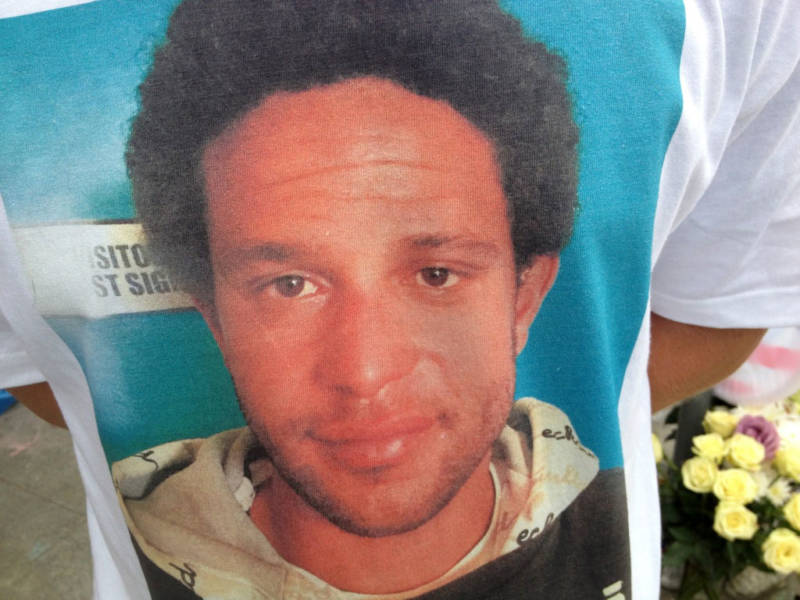 A friend of Brendon Glenn wears a t-shirt with his photo. Glenn was fatally shot by LAPD officers May 5, 2015.
