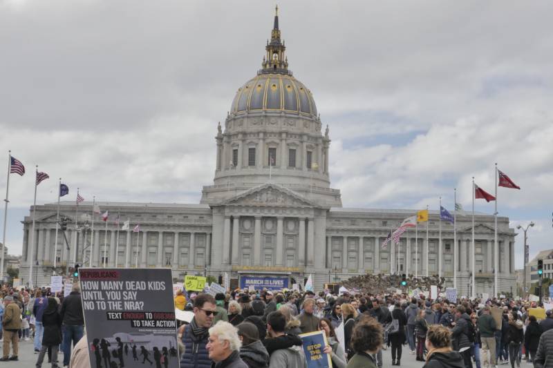 Students and adults milled in front of San Francisco city hall as part of the March for Our Lives demonstration.