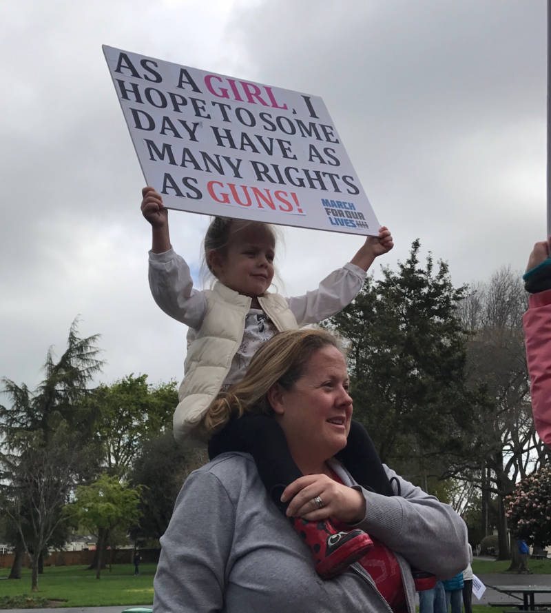 Kate Reed, 40, from Burlingame with her daughter at Washington Park in Burlingame. Hundreds of people turned out.