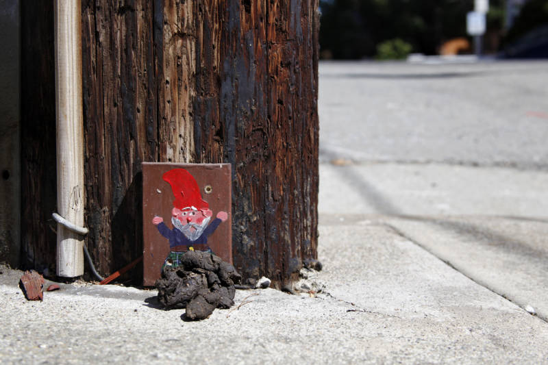 Being on the sidewalks of Oakland can sometimes be a messy spot for the gnomes. This particular one was recently visited by a local dog.