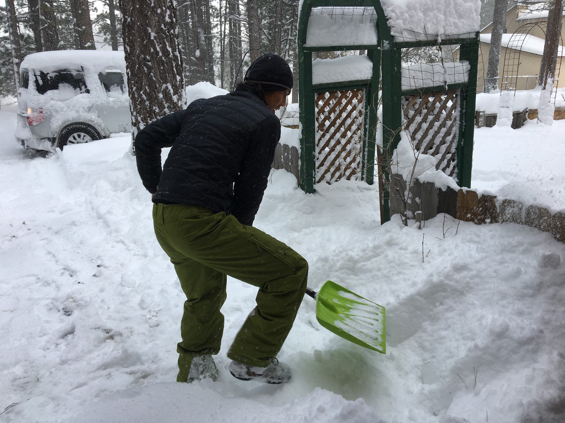 Jin Joo shovels his driveway near Lake Tahoe after a blizzard dumped 3 feet (1 meter) of snow in the Sierra Nevadas.