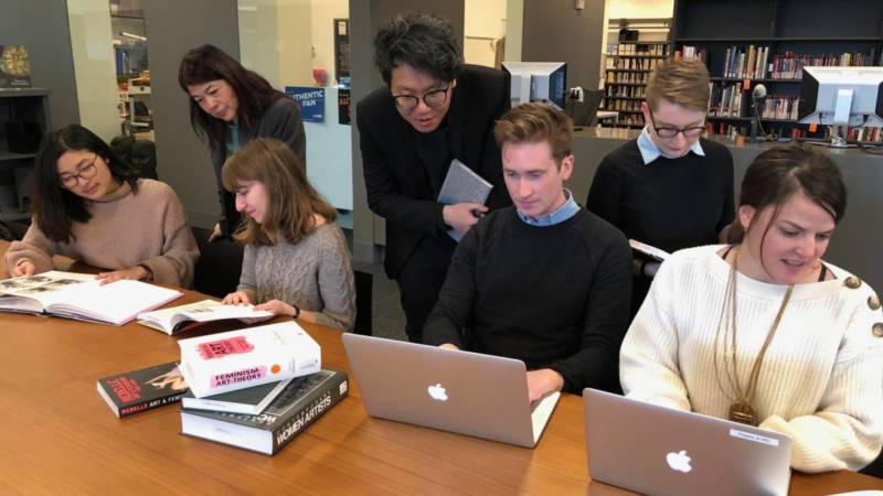 Editors hard at work at the first annual Art+Feminism edit-a-thon hosted by Stanford's Bowes Art and Architecture Library in 2017.