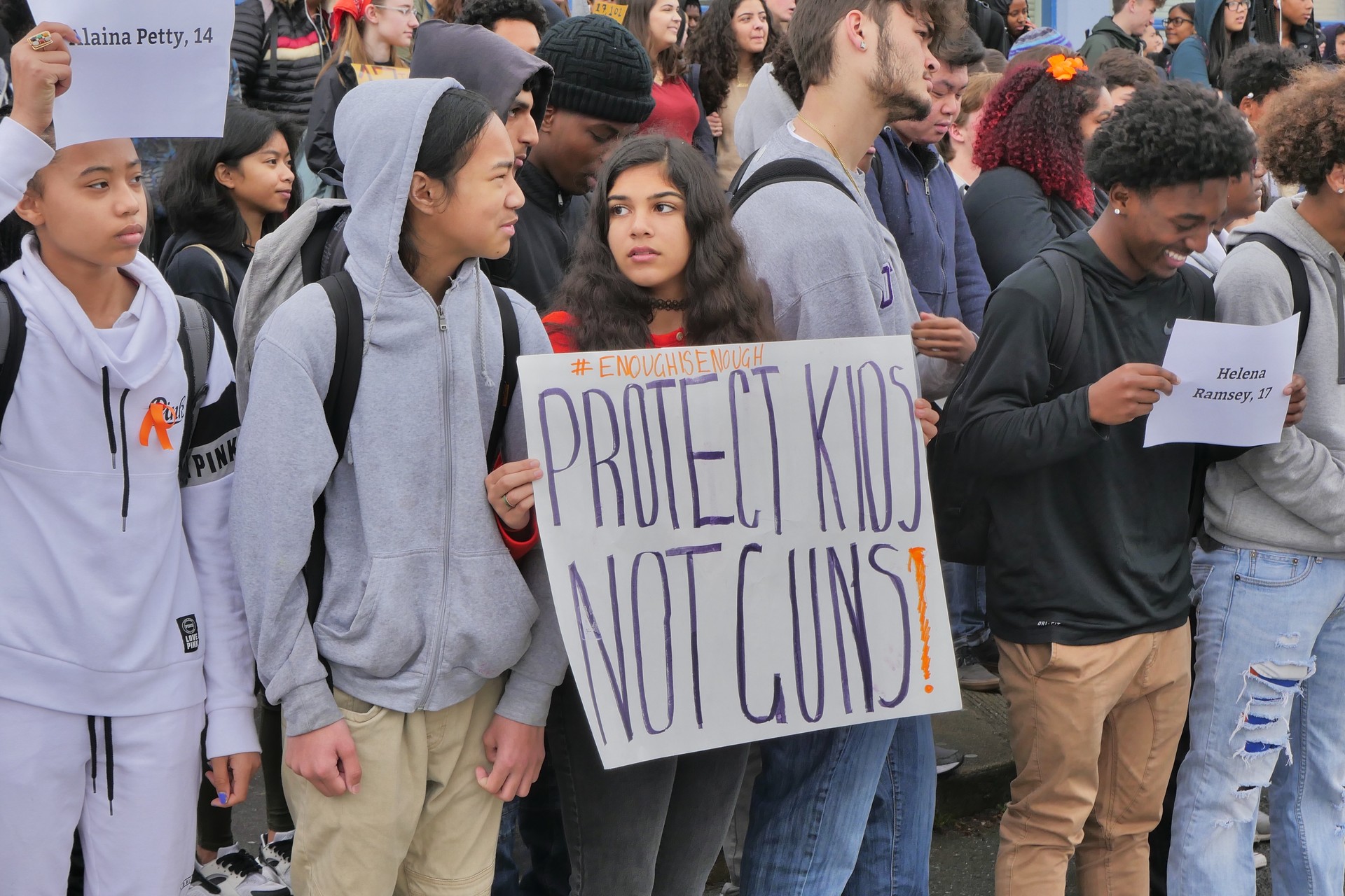 A student from Encinal High School in Alameda holds up a sign during a walkout to protest gun violence on March 14, 2018.