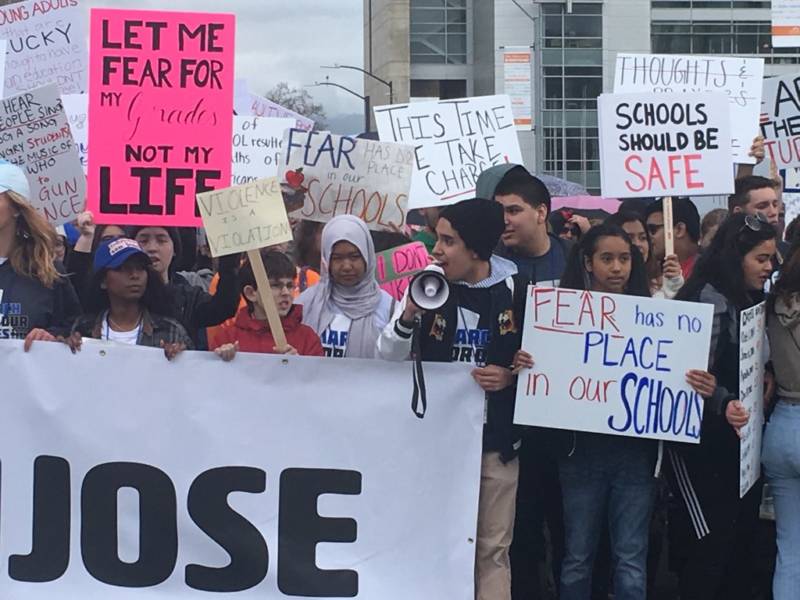 Students lead a march through San Jose. Adults lined the route and cheered on the student organizers as they began their march from San Jose City Hall.