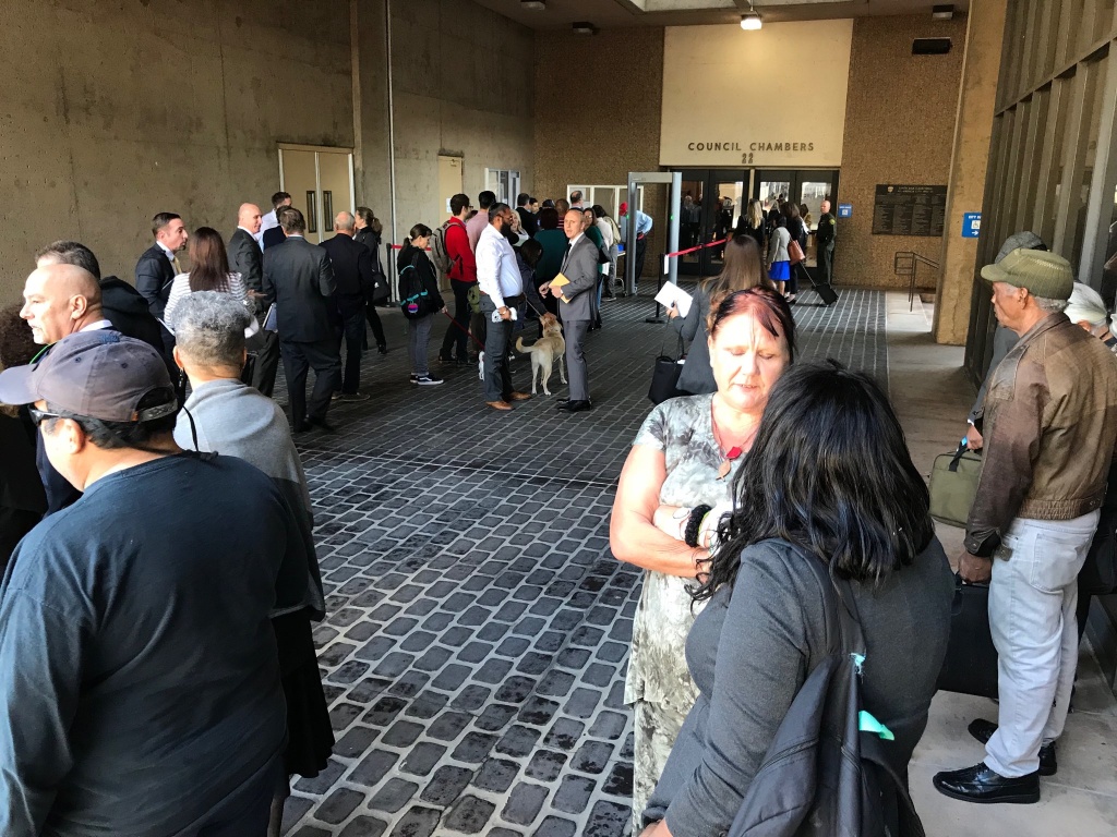 People line up on Saturday, March 17, 2017 to get into an Orange County courtroom for a hearing, presided over by Judge David O. Carter, addressing what to do about 700 homeless people who were recently removed from their encampments along the Santa Ana riverbed.