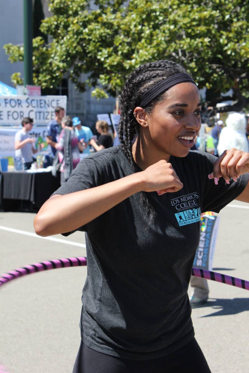 Malia Kankanui of Brentwood breaks a sweat while learning centripetal force through hoola hooping. Kankanui is a chemical engineering student at a community college in Pittsburg and says she 'loves' science.