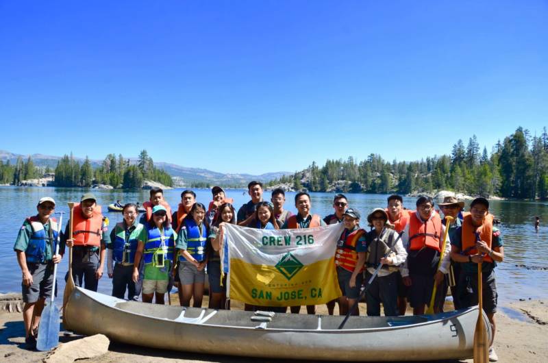 Lucas Tran (back row in sunglasses) and Scout Crew 216 canoe camping at Utica Reservoir in 2017.