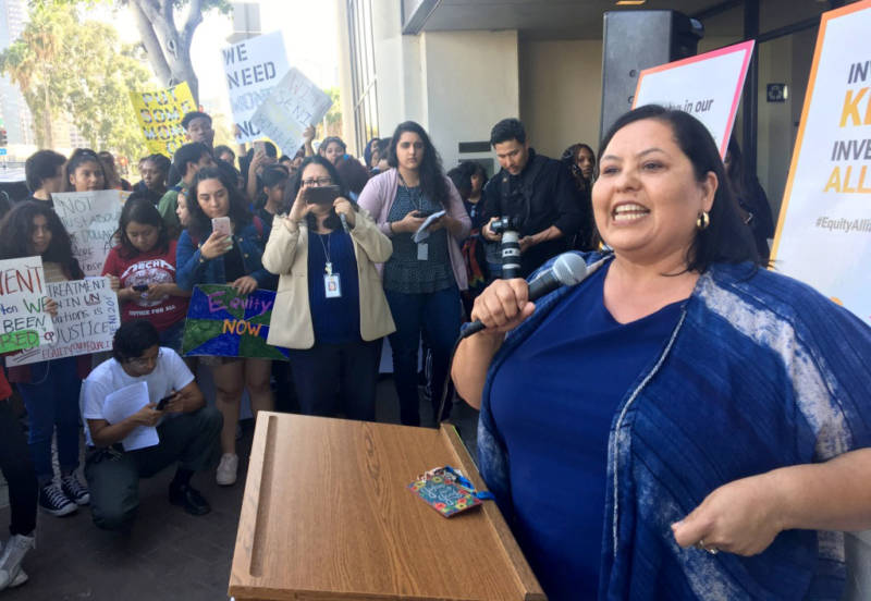 Los Angeles Unified School Board President Mónica García addresses a crowd of students and parents from Inner City Struggle and the Community Coalition of South L.A. The group gathered on Tuesday, April 10, 2018, to support García's resolution to re-write the district's "Student Equity Needs Index."