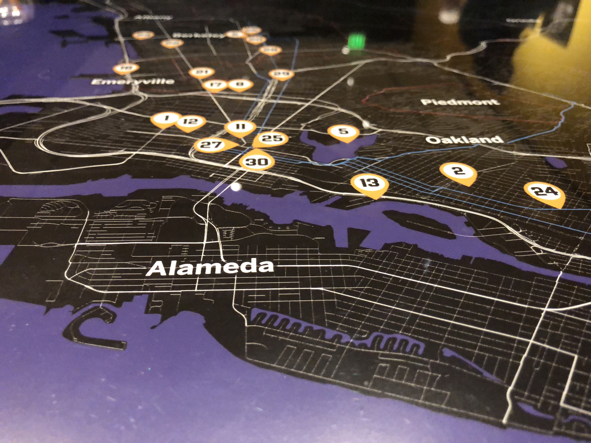 A map at the exhibit pinpoints parts of the Bay Area of important hip-hop landmarks and history.
